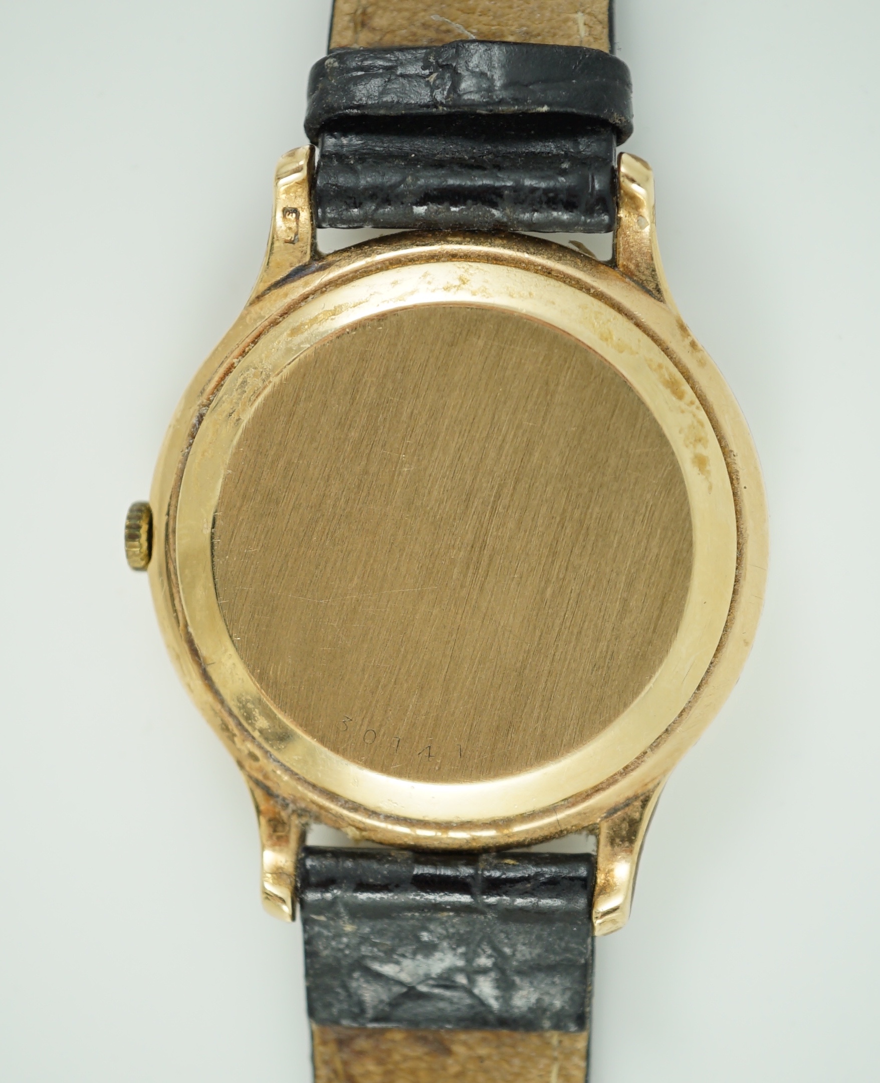 A gentleman's 9ct gold Jaeger LeCoultre manual wind dress wrist watch, on associated strap